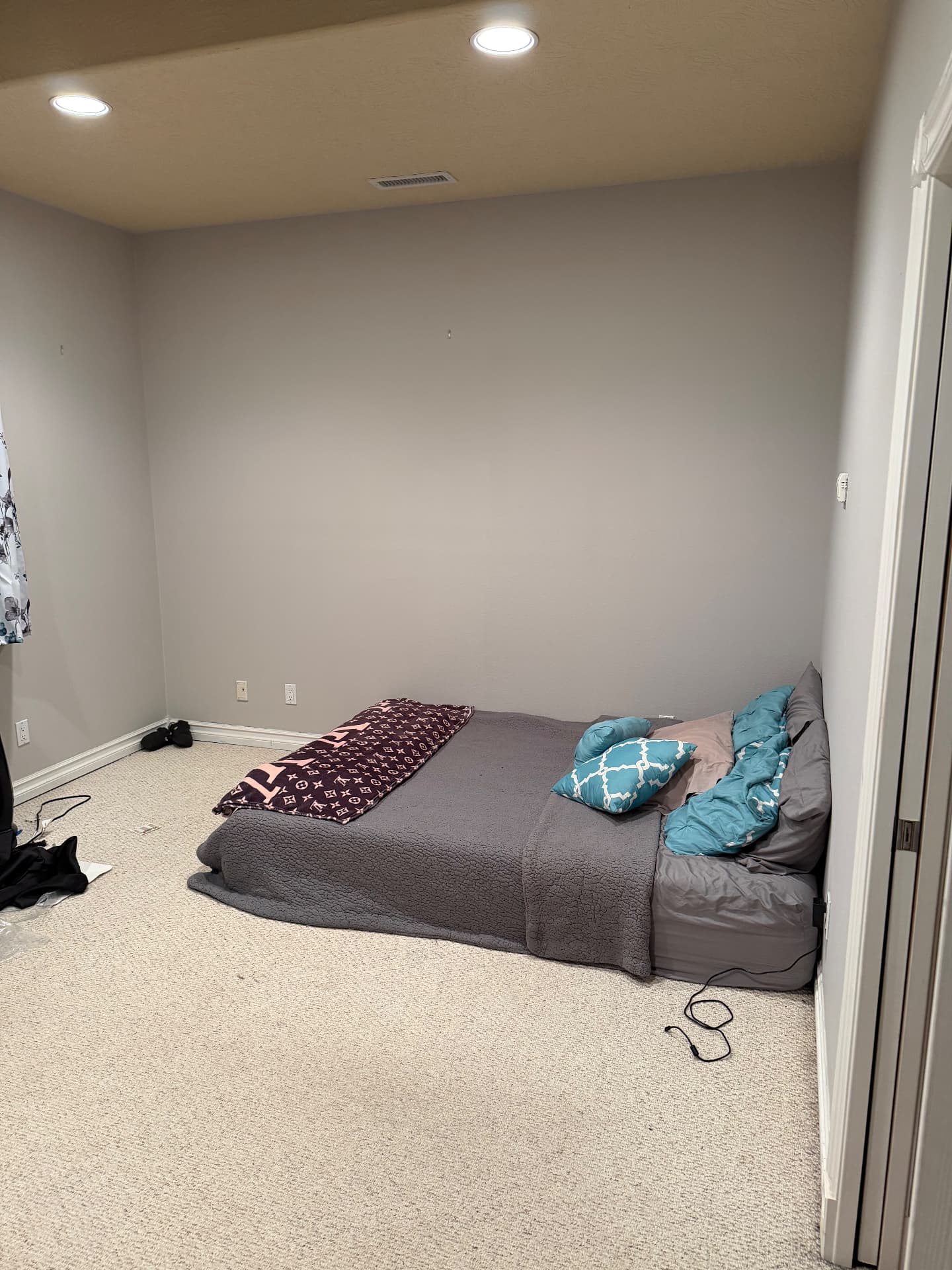 Painted bedroom with crisp white baseboards